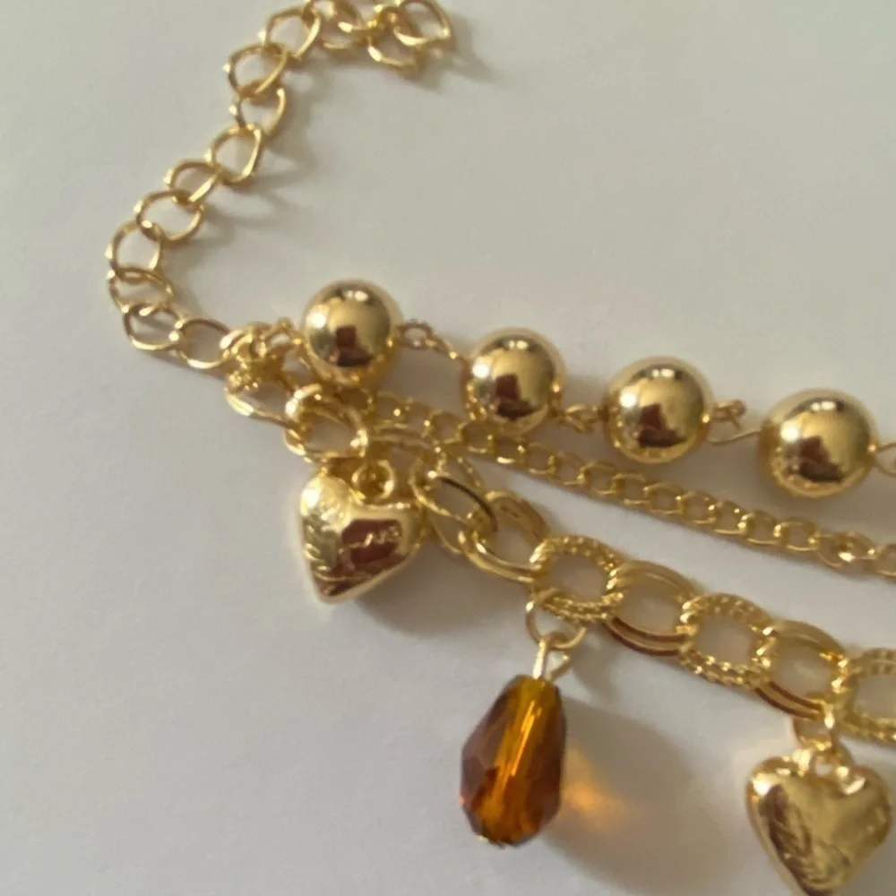 None boutique gold